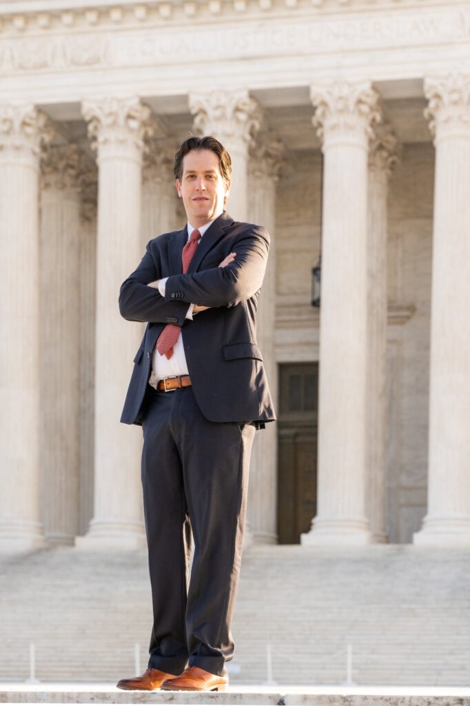 Adam Fomby on the steps of the U.S. Supreme Court